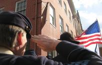 Man saluting American Flag in Civil War Uniform