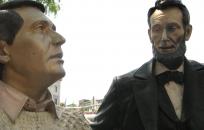 Statue of Lincoln talking to another statue